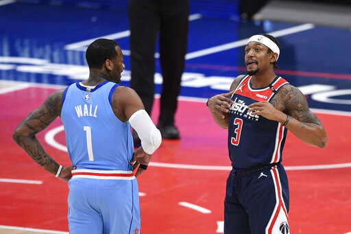 Beal outduels ex-teammate Wall, Wizards top Rockets 131-119